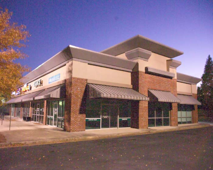 A Building With Cream and Brick Details