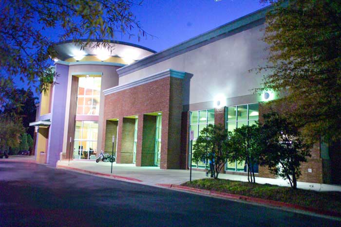 A White Color Building With Brick Details